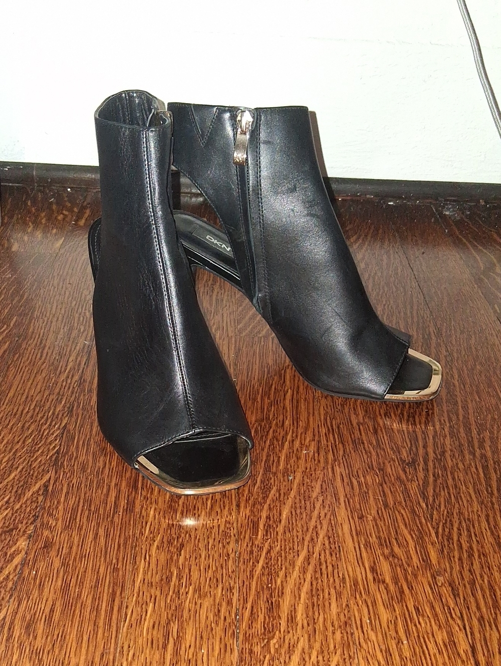 DKNY Black Leather Peep-Toe Ankle Booties with Gold Trim